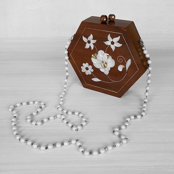 hexagonal wooden hand bag inlayed with mother-of-pearl