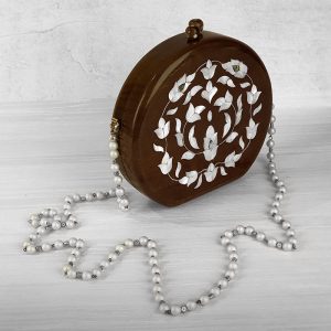 wood hand bag inlaid with mother-of-pearl